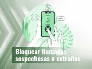 Una mano que sujeta un móvil y otra que pulsa la señal de bloquear llamada sospechosa o extraña.