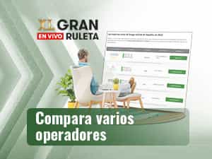 Hombre sentado delante de una pantalla grande para comparar casinos online.
