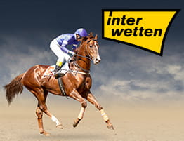Un jinete y el logotipo de Interwetten, que ofrece apuestas a caballos en España.