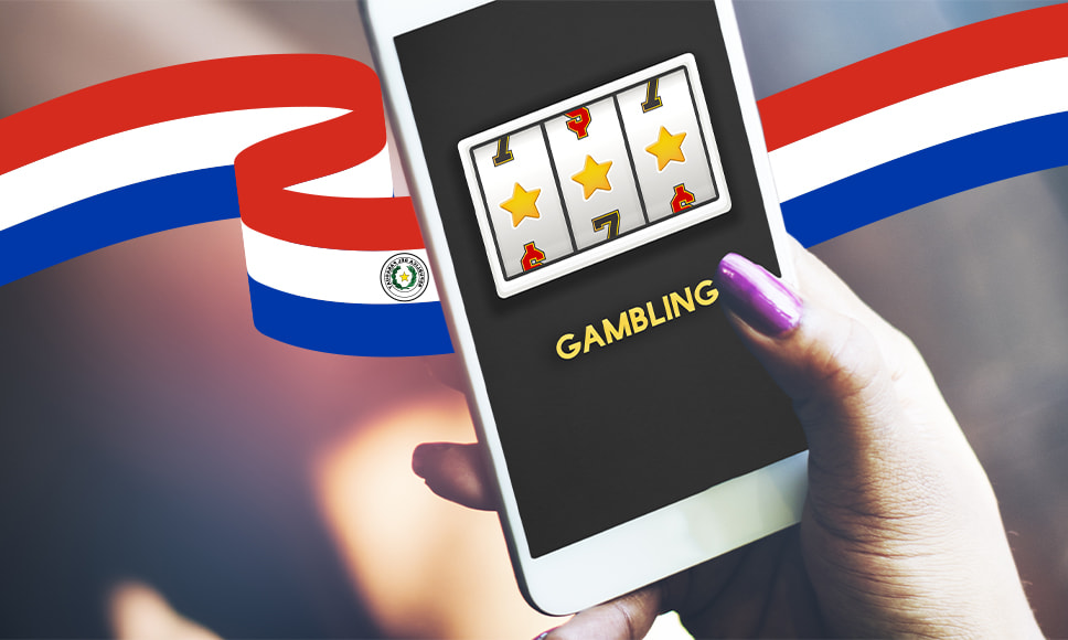 Celular con la palabra “gambling” y la bandera del Paraguay.