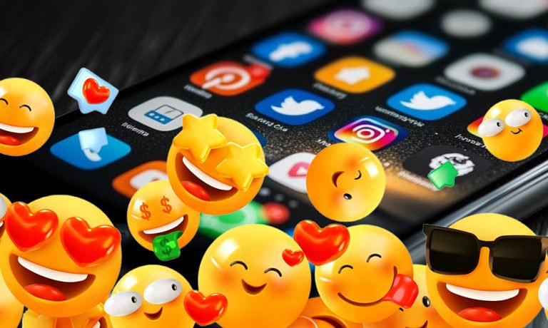 Emojis saliendo de un teléfono móvil.