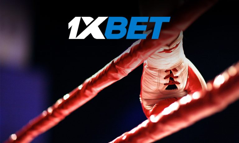 Guante de boxeo en un ring con el logo de la casa de apuestas 1xbet.