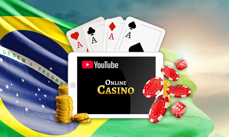 Tablet con un anuncio de casino online, fichas y cartas de póker sobre la bandera de Brasil.