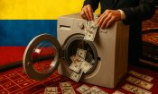 Una lavadora y billetes sobre un tapete de ruleta y la bandera de Colombia.