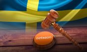 Logotipo de Betsson, mazo de justicia y bandera de Suecia.