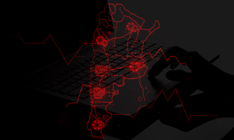 Mapa de Argentina sobre teclado con gráficos en rojo